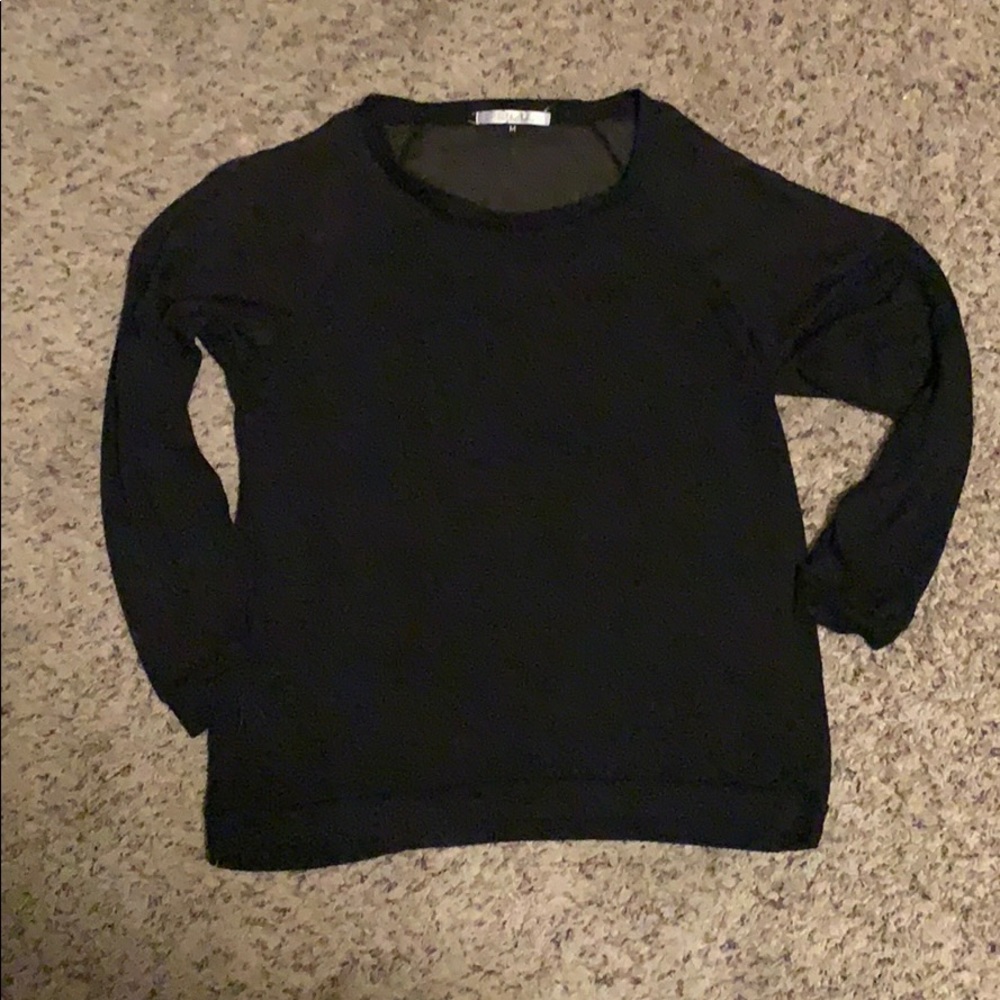 Black sweater. Sheer shoulders
